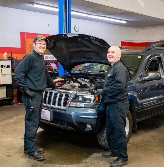 Mechanic working on Jeep